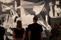 People looking at Guernica