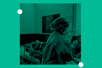 A patient suffering from COVID-19 receives treatment inside the emergency ward at Holy Family hospital in New Delhi