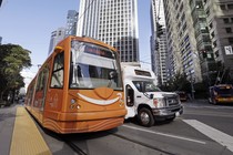 A streetcar with the Amazon logo on a Seattle street