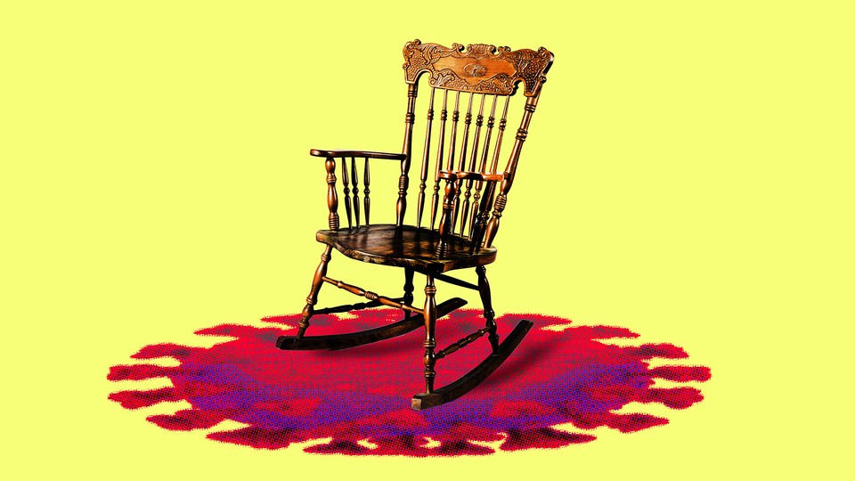 An image of an empty rocking chair with a covid particle underneath