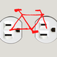 An illustration of a bicycle superimposed over two electrical sockets