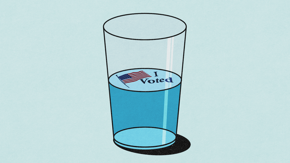 A glass filled halfway with blue liquid. An "I Voted" sticker floats at the top.