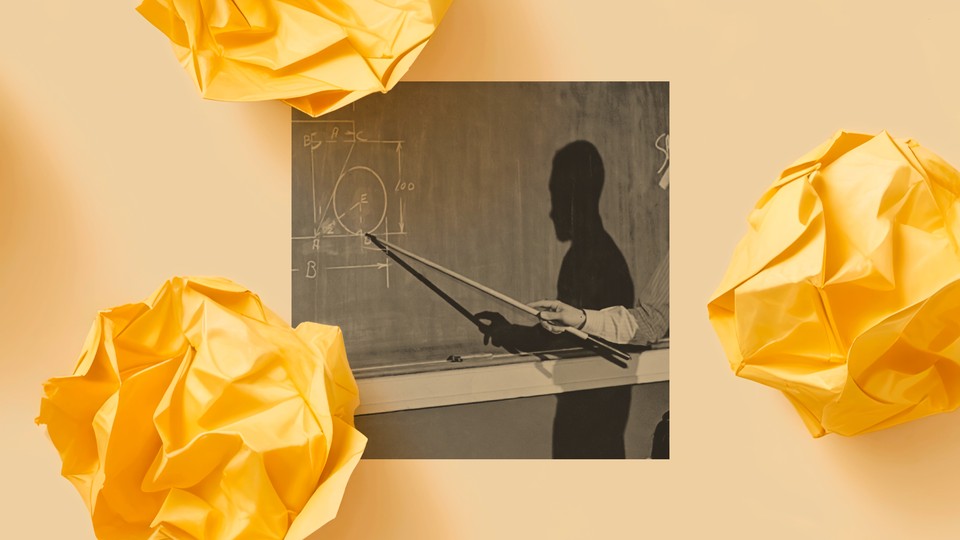 A black-and-white photo of a male teacher using a stick to point at a mathematical drawing on a chalkboard