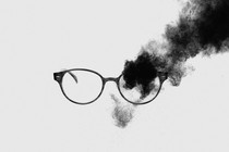glasses obscured by black fog
