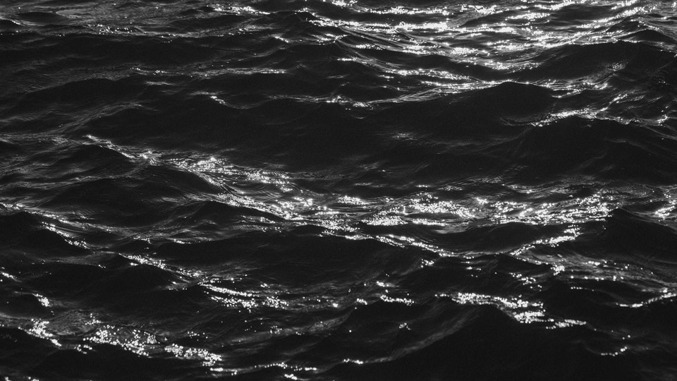 Black-and-white photograph of waves