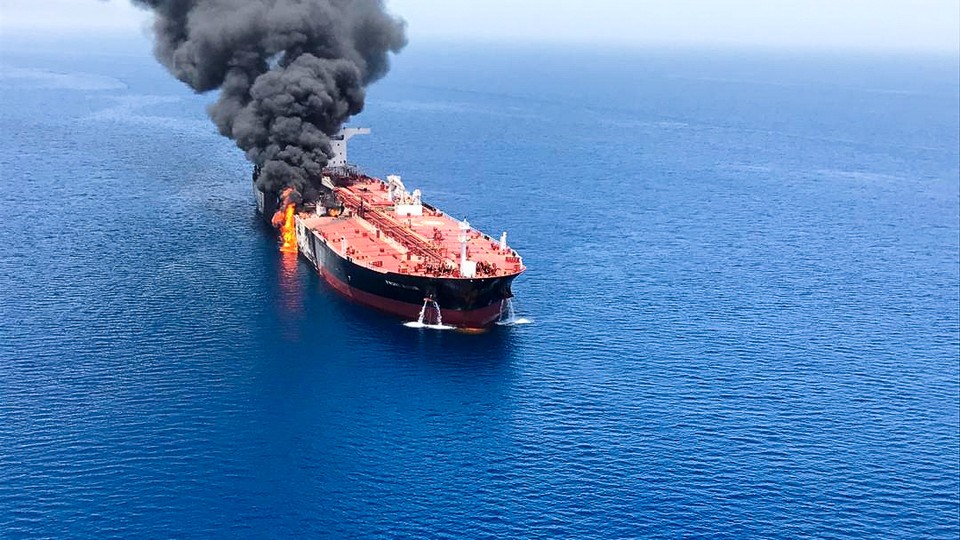 An oil tanker attacked at the Gulf of Oman