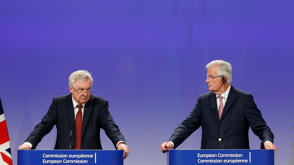 U.K. Brexit Secretary David Davis and EU’s Chief Brexit Negotiator Michel Barnier