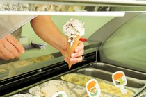 Image of an ice-cream scooper working