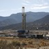 A fracking well near mountains