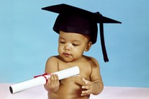 baby with graduation cap and diploma