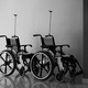 Empty wheelchairs in a health-care setting.