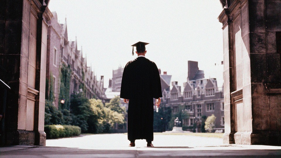 A college graduate wearing a cap and gown.