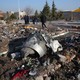 Rescue teams amid the debris of a Ukranian jet that crashed near Tehran’s airport.