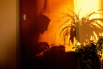 A person sitting at a computer