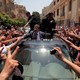 Mohamed Morsi greets supporters during Egypt's June 2012 presidential election.