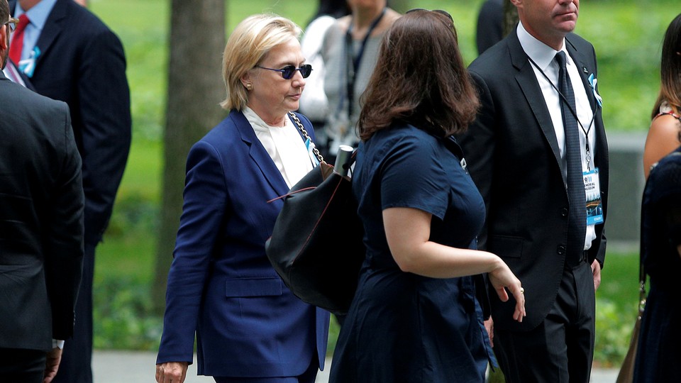 Hillary Clinton on the sidewalk outside her daughter's apartment Sunday