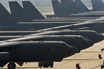 An image of US Air Force B-52H long range strategic bombers sitting on a tarmac.