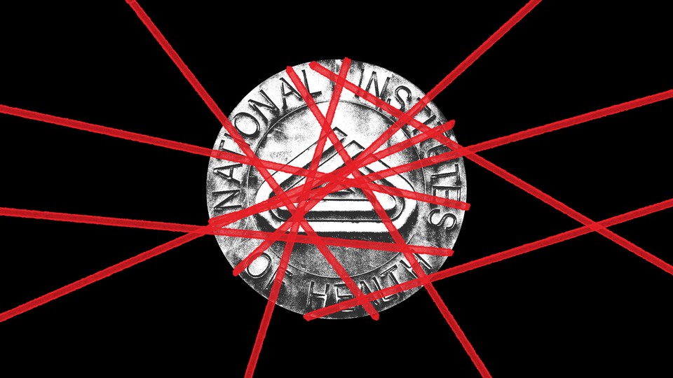 An NIH medallion caught in red tape