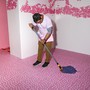 Museum of Ice Cream employee mopping the floor