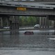 An abandoned Hummer is covered in floodwaters on Interstate 610 after Hurricane Harvey inundated the Texas Gulf coast with rain.