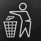 Sign with "Don't Litter" sign-style outline of person throwing gun into trash