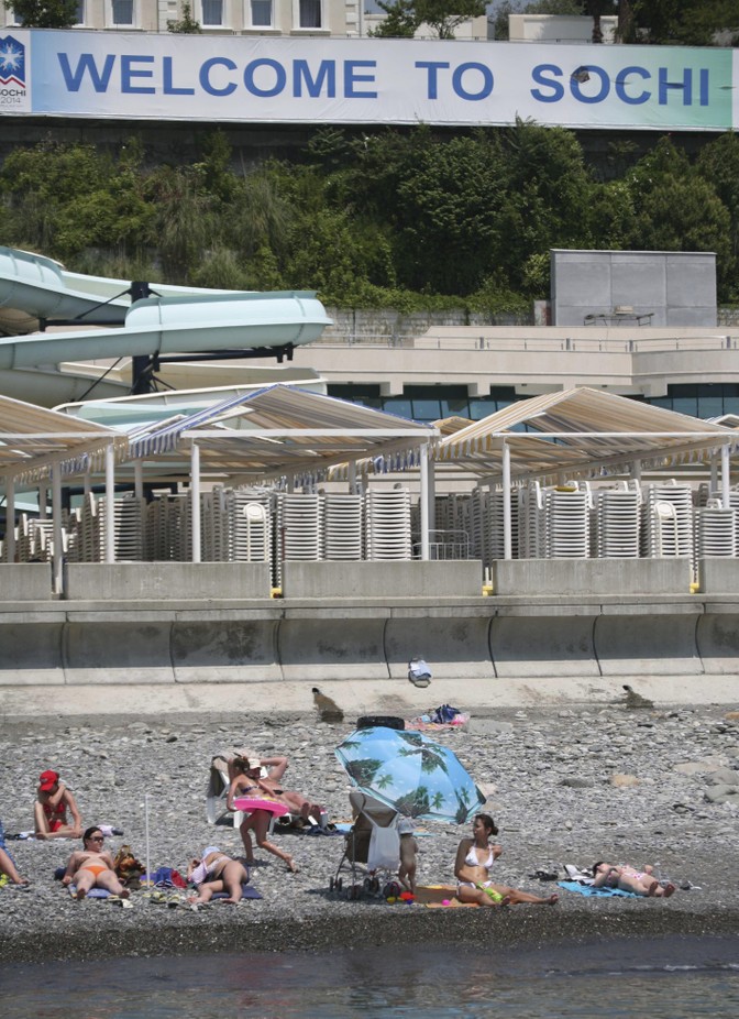 Holidaymakers relax on the beach in Sochi.