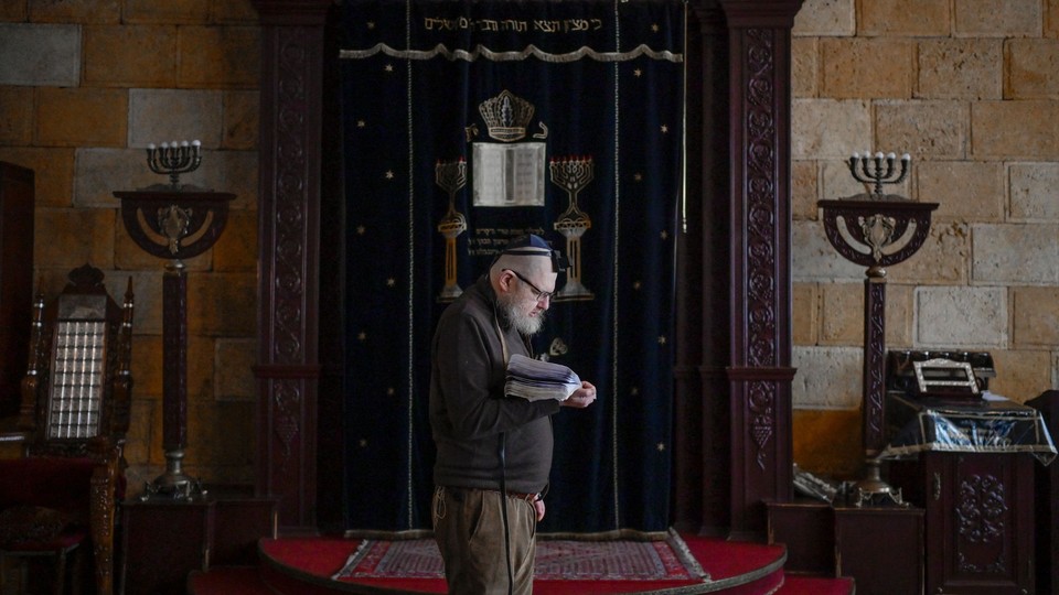 A Jew prays in the Chabad Synagogue in Odessa
