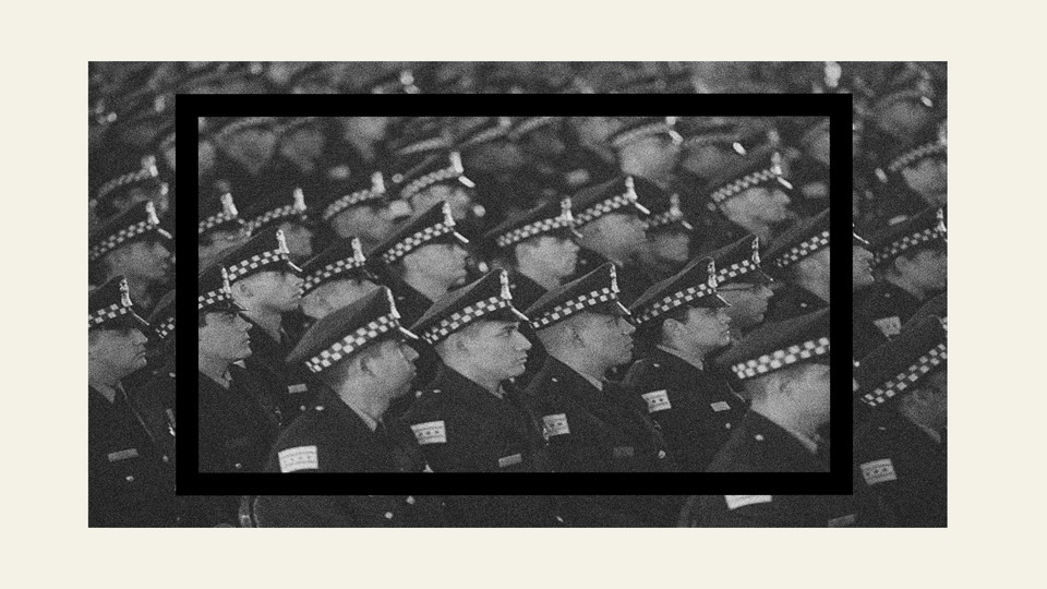 a black and white photo of police officers in checkered hats