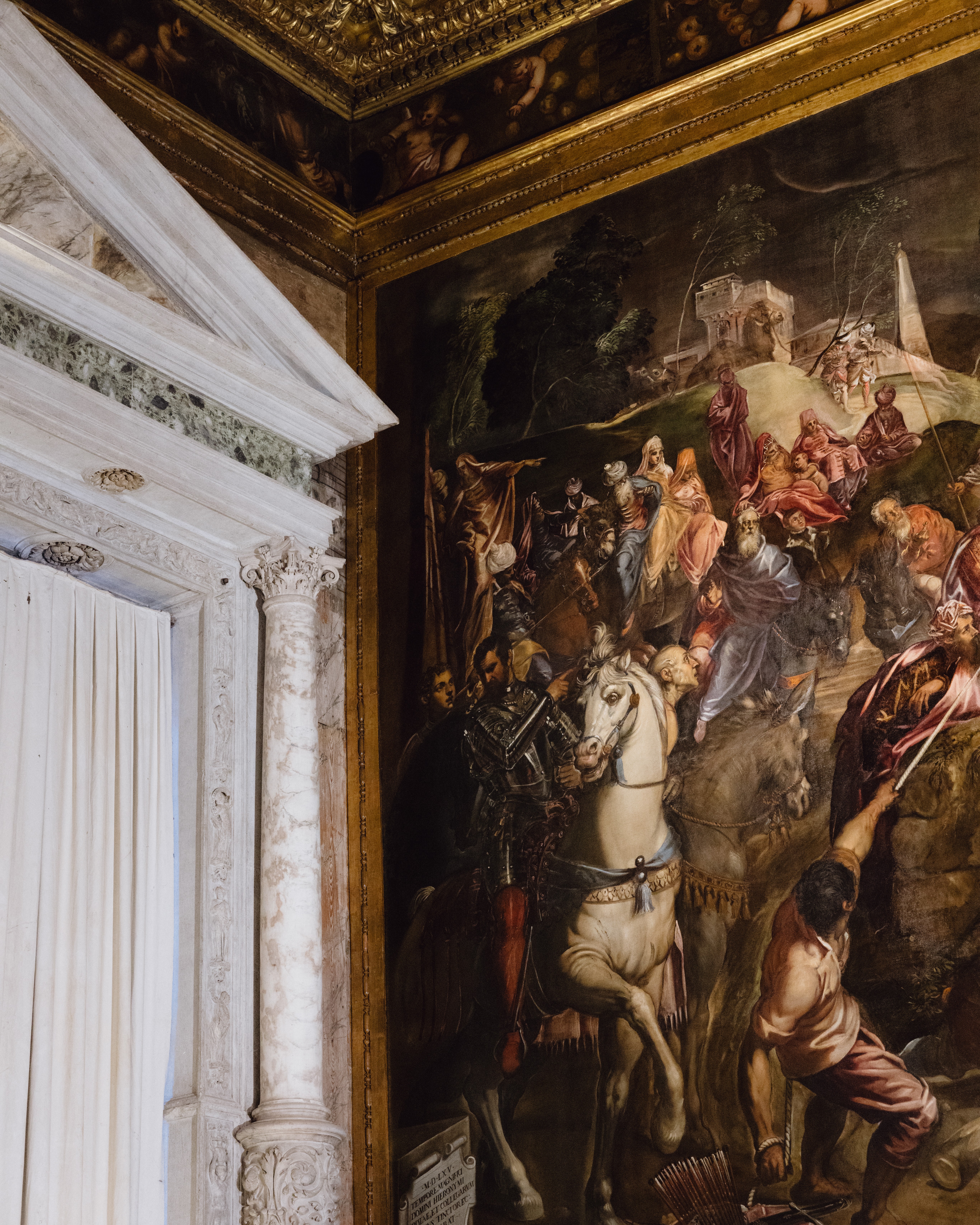 A painting by Tintoretto on the wall