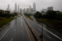 The city of Atlanta, seen through fog from a highway