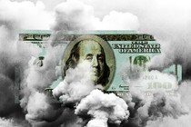 A $100 bill among a cloud of fumes