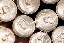 Overhead image of multiple aluminum soda cans