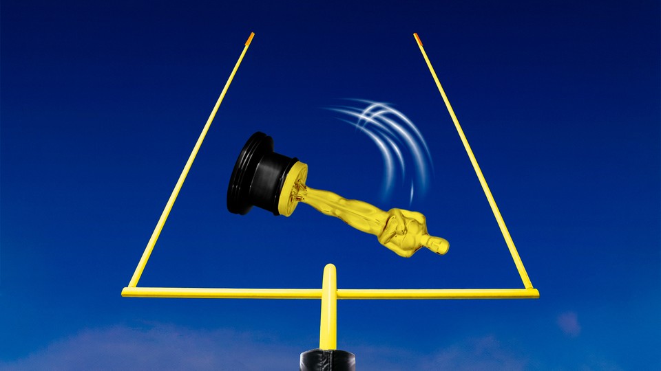 An Academy Award sailing through football uprights