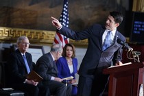 Paul Ryan speaks in front of Mitch McConnell, Chuck Schumer, and Nancy Pelosi on Capitol Hill.