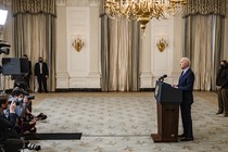 President Joe Biden addresses cameras from a lectern