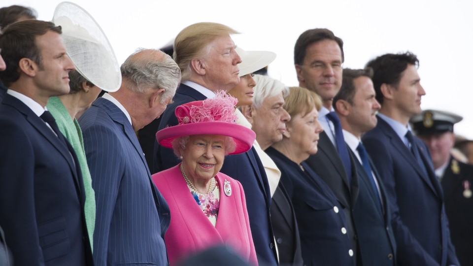 World leaders including Emmanuel Macron, Theresa May, Queen Elizabeth II, Donald Trump, Angela Merkel, and Justin Trudeau attend a ceremony marking the 75th anniversary of D-Day in Portsmouth, England.