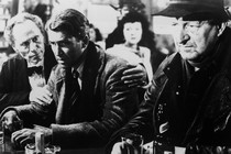 Jimmy Stewart as George Bailey, depressed at a bar, in "It's a Wonderful Life"