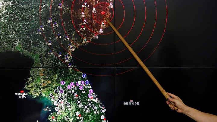 Ryoo Yong-gyu, Earthquake and Volcano Monitoring Division Director, points at where seismic waves observed in South Korea came from, during a media briefing at Korea Meteorological Administration in Seoul on September 9.