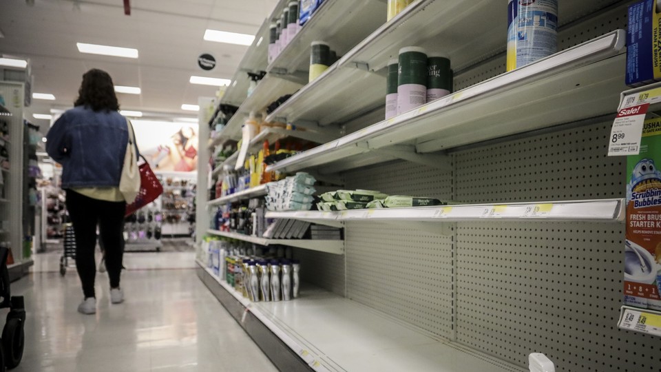 Empty shelves for disinfectant wipes in New York