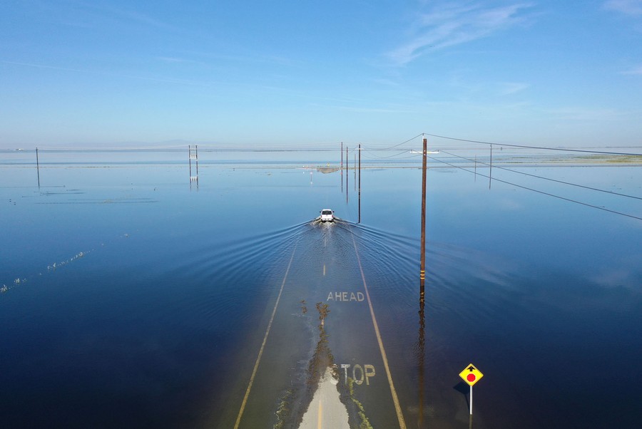 An elevated view of a broad, flat, flooded area