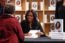 Michelle Obama signing books