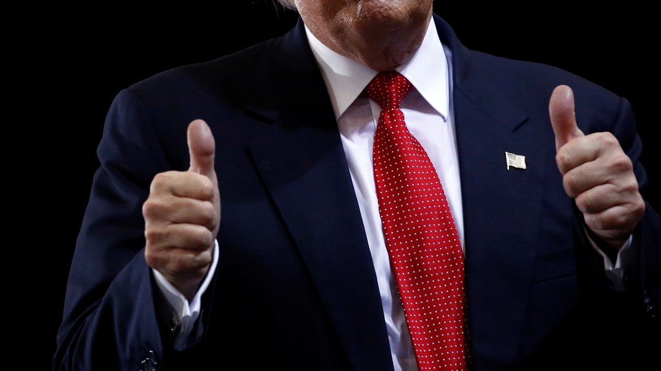 Trump gives thumbs-up.