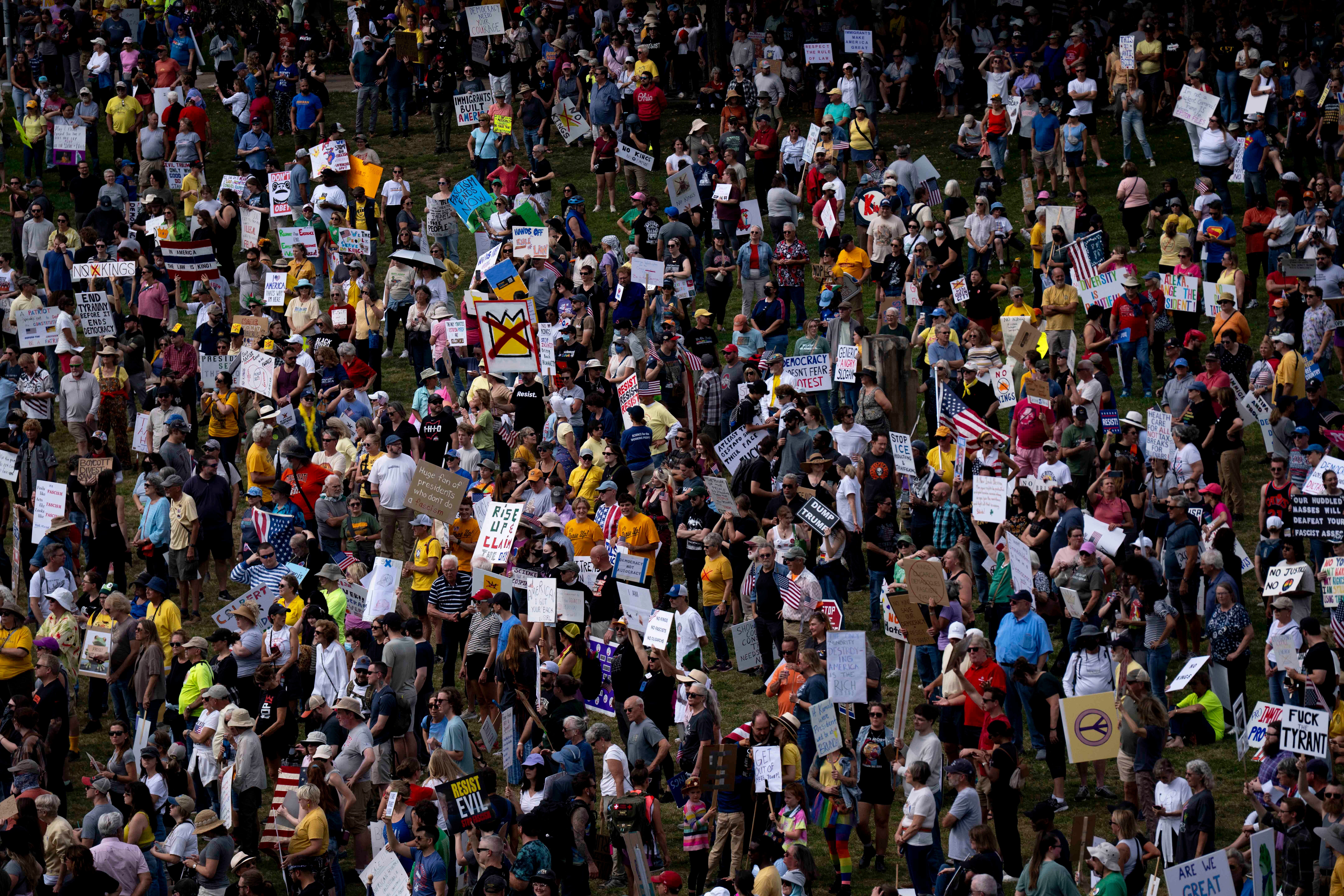 An elevated view of a large crowd of protesters