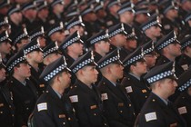 crowd of police officers in uniform