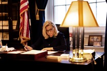 Photo of Liz Cheney at her desk in the U.S. Capitol in 2021