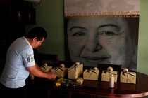 The urns of six victims of the El Mozote massacre are seen during a wake in San Salvador, El Salvador, on December 7, 2018.