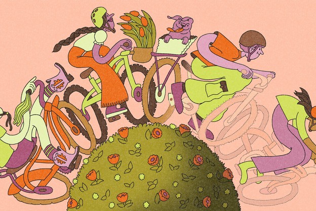 A line of four kids biking, with the bicycles of the last two fading away
