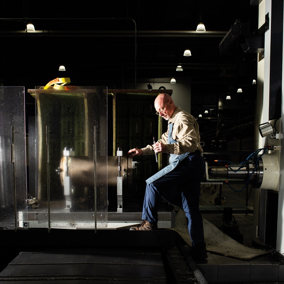 Worker with Miliing Machine inside of the Kairos Power Pland