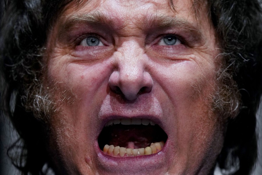 A very close image, showing a man's face as he shouts