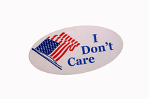 An oval sticker with an American flag and the words "I don't care" in blue